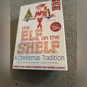 Like new elf in the shelf with a book